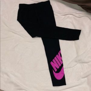 Black Leggings with purple Nike Symbol